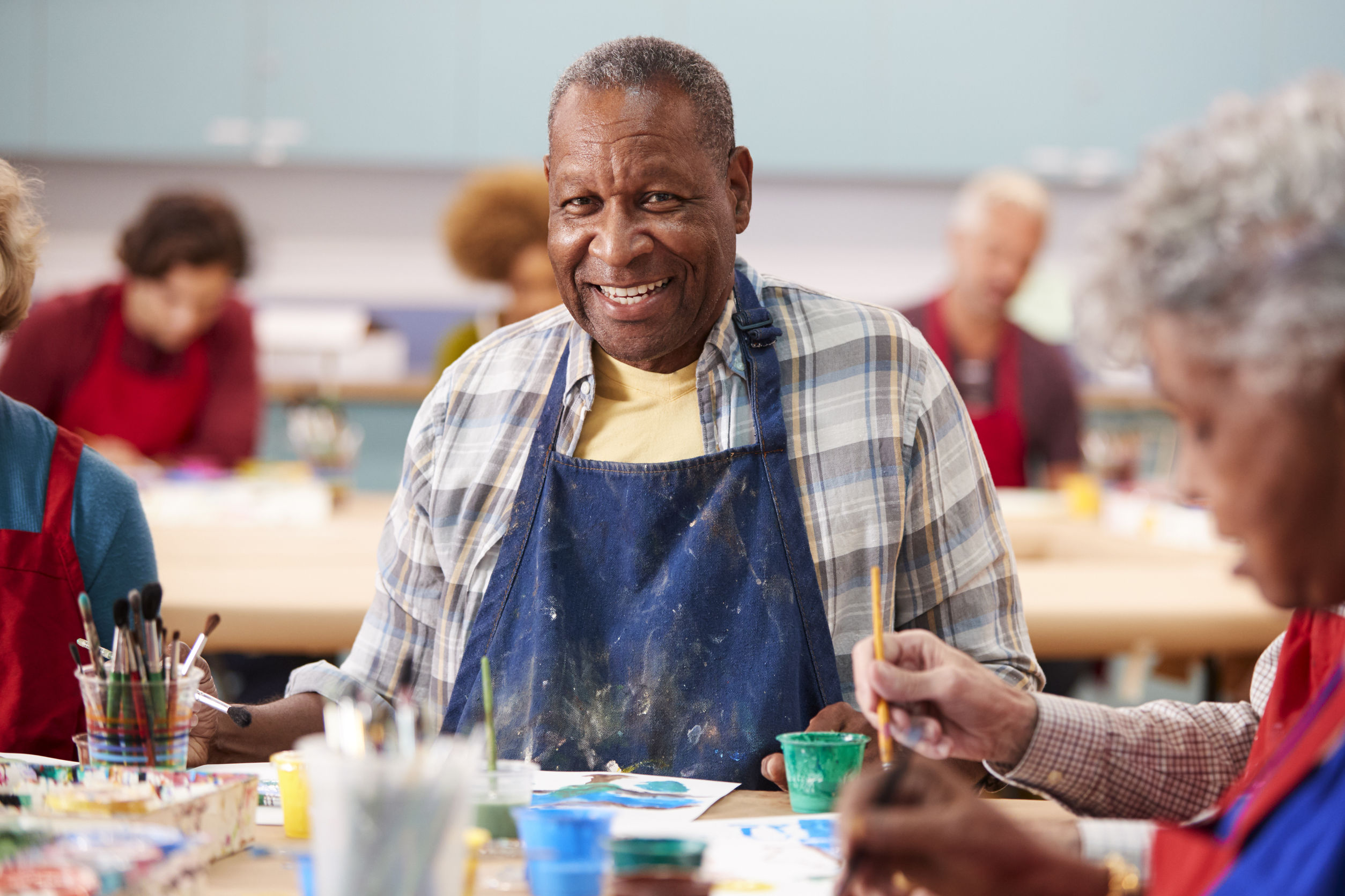 Portrait Of Retired Senior Man Attending Art Class